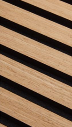 Close-up of modern wood slat panel with black gaps, diagonal minimalist interior design
