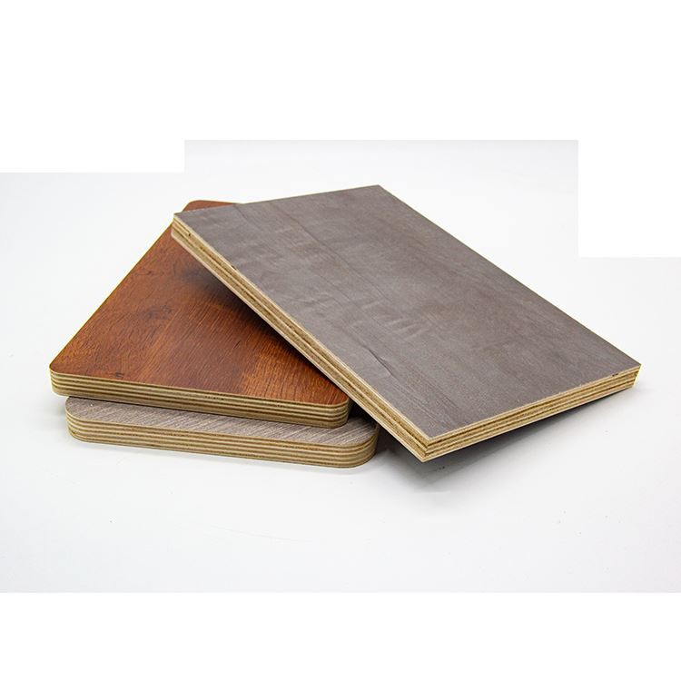 Gray and brown laminated plywood sheets showing layered edges on white background