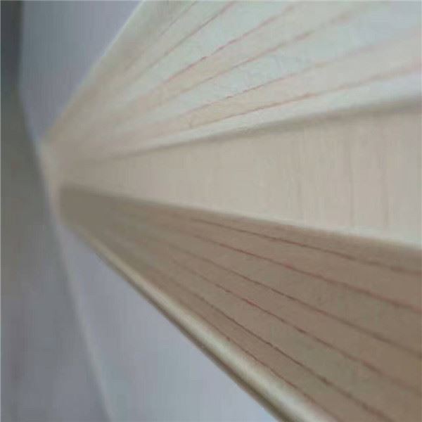 Diagonal grooved wall paneling in light wood with minimalist architectural perspective