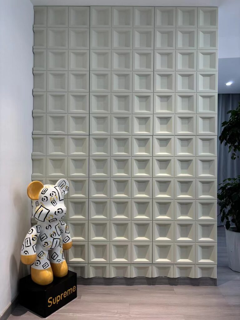 Modern geometric wall interior with pop art bear sculpture on Supreme pedestal