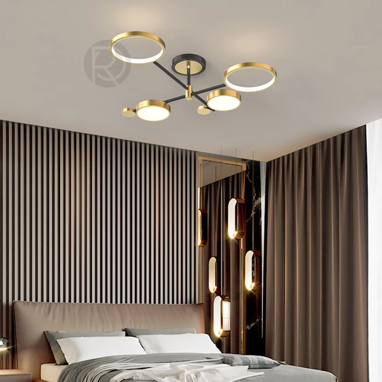 Modern luxury bedroom with geometric ceiling light, wood accent wall, and warm lighting