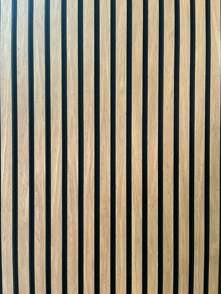 Modern vertical wood slat wall with alternating black stripes