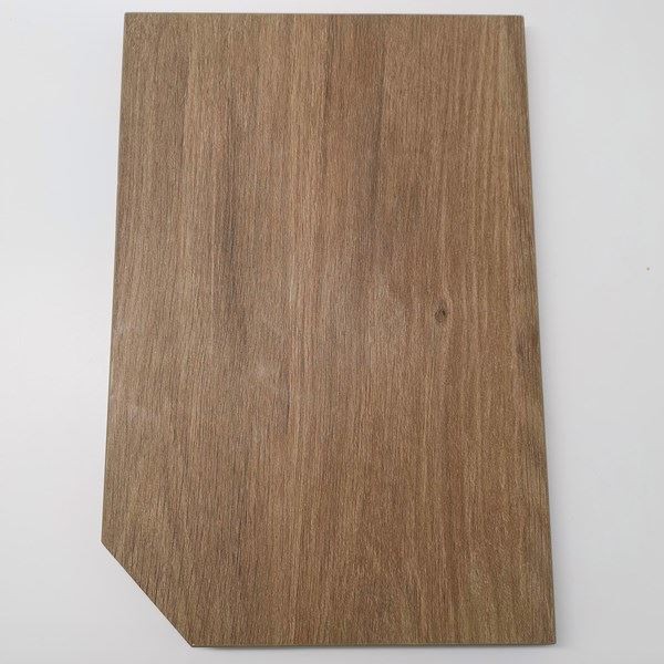 Brown wood panel with visible grain and diagonally cut corner on white background